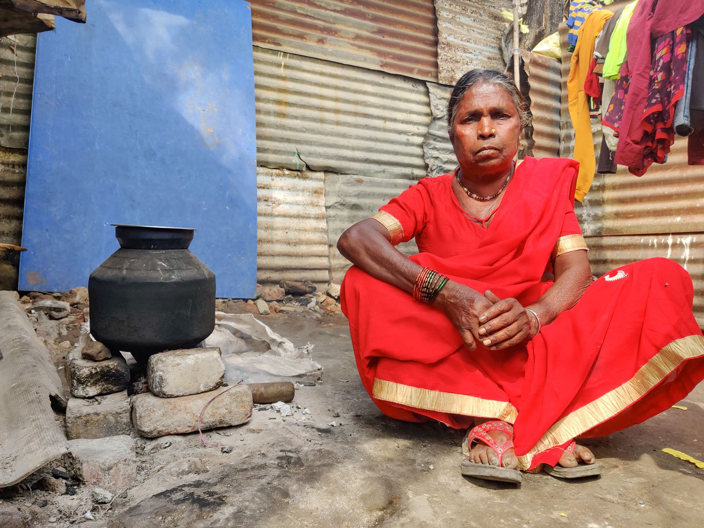 Shakuntala Londhe, 65, has a speech impairment. She spends two to three hours a day inhaling smoke generated by the stove
