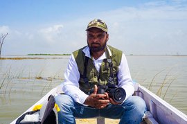 Birdman and boatman of Nal Sarovar