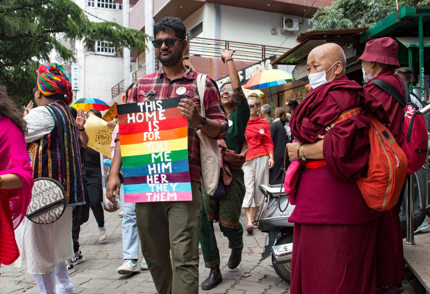 A participant holds a placard in support of the LGBTQIA+ community during the first-ever Pride march in Dharmshala on April 30, 2023